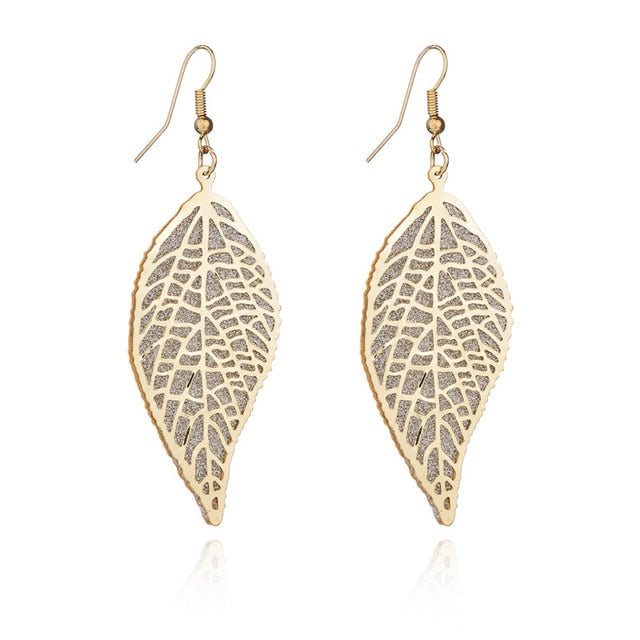 Long golden flower leaf earrings for women