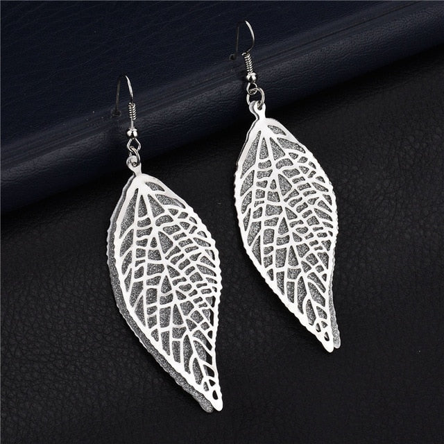 Long golden flower leaf earrings for women