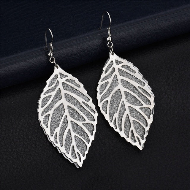 Long golden flower leaf earrings for women